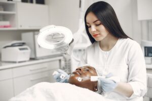 A Specialist Doing Skin Care Program on a Client